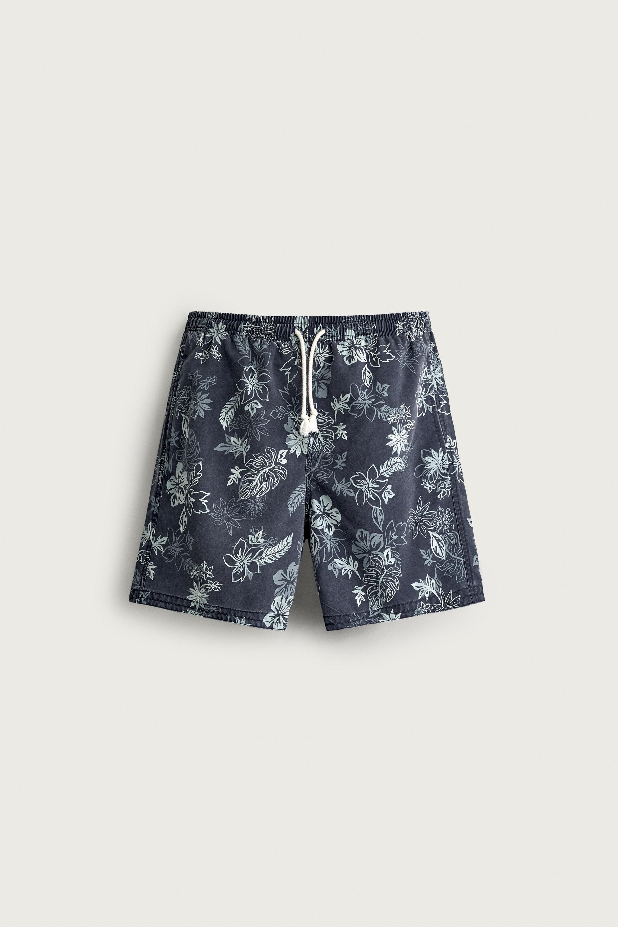 FLORAL PRINT LONGLINE SWIM SHORTS